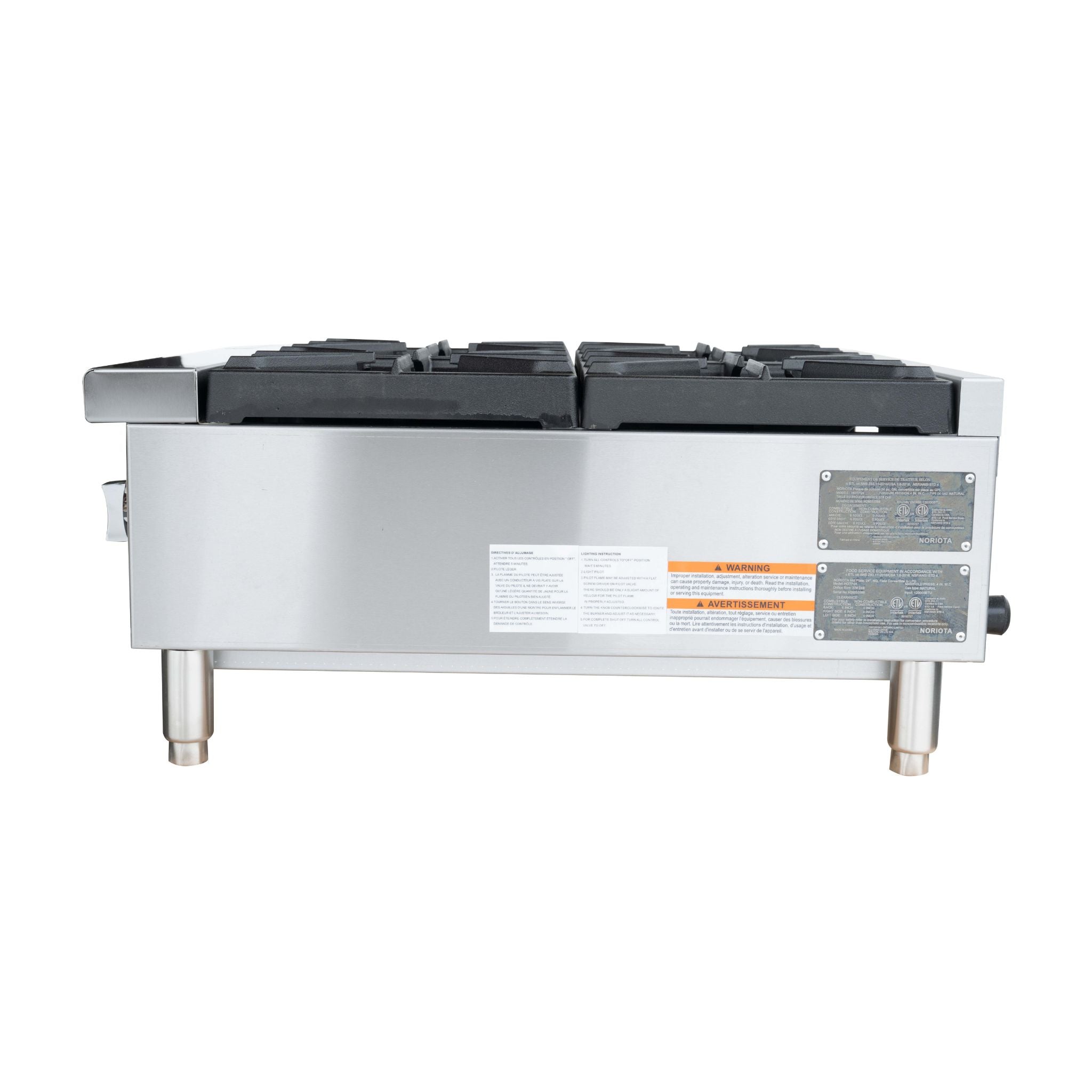 A commercial gas hotplate  with a stainless steel body and black grates, shown from the back against a white background.