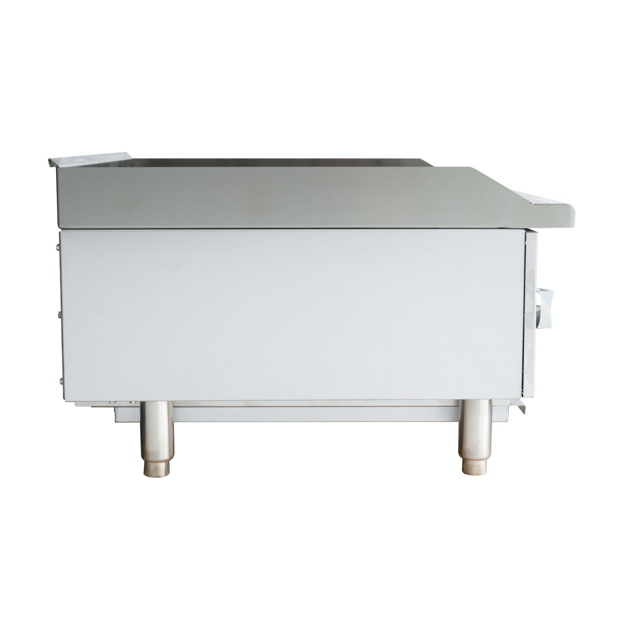A commercial stainless steel counter top charbroiler with a flat top surface, side view,  and two legs, shown from a side angle on a white background.