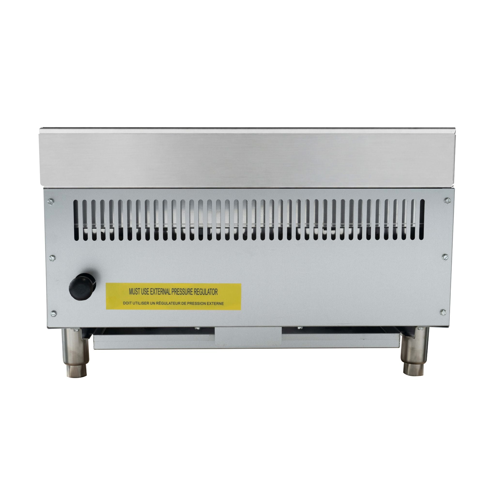 A stainless steel commercial gas appliance charbroiler, shown from the back with a yellow warning label and a black valve connector.