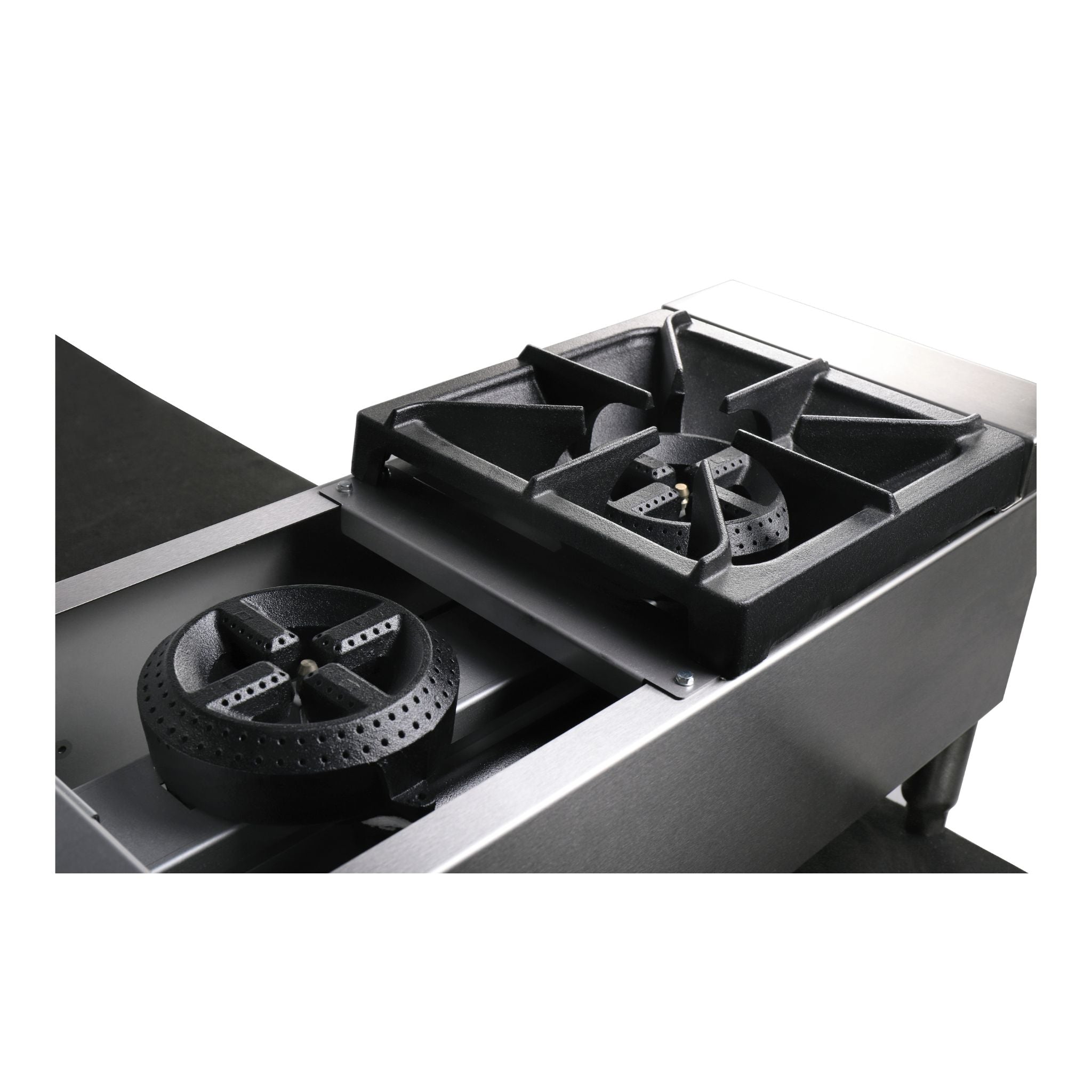 Close up detail of the gas cast iron burners black gas stove with four burners on a white background