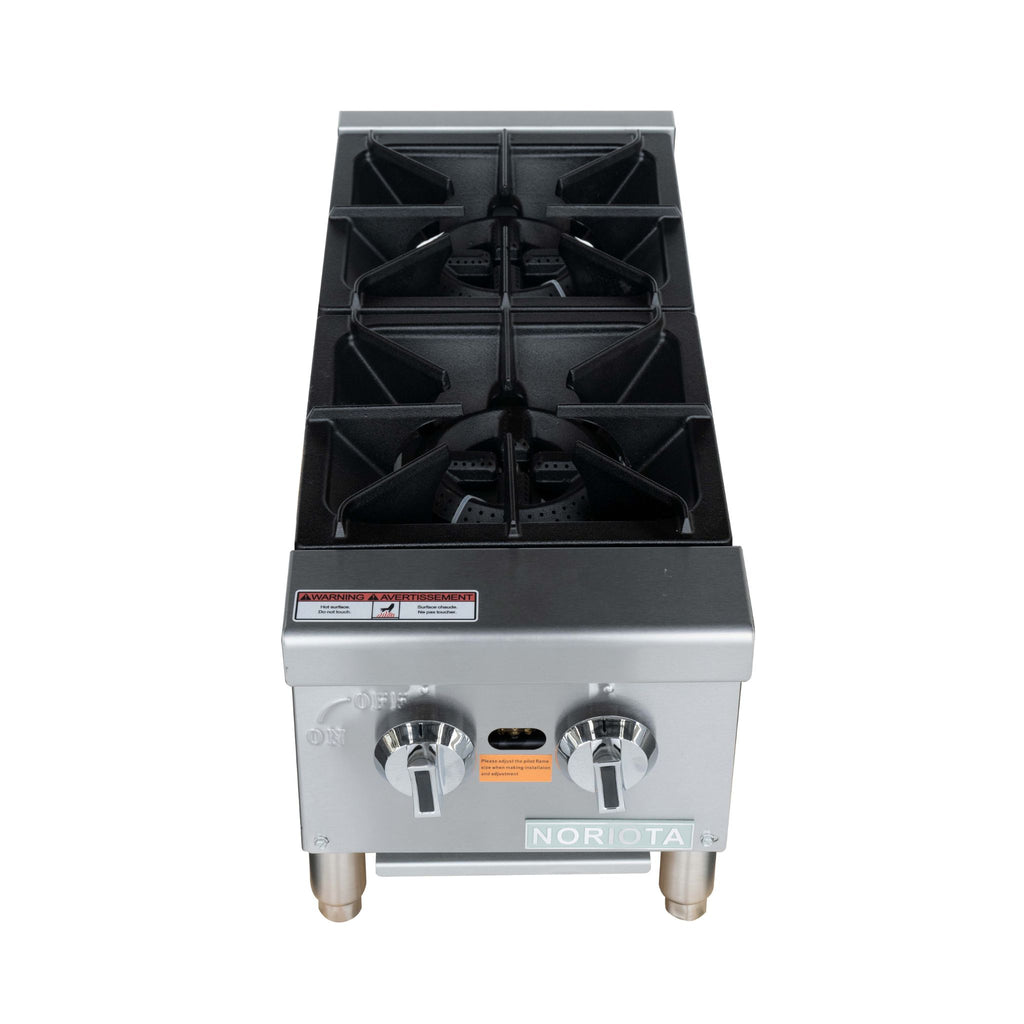 A commercial two-burner gas stove top or hot plate with a stainless steel body, black cast iron grates, and two silver control knobs on a white background.