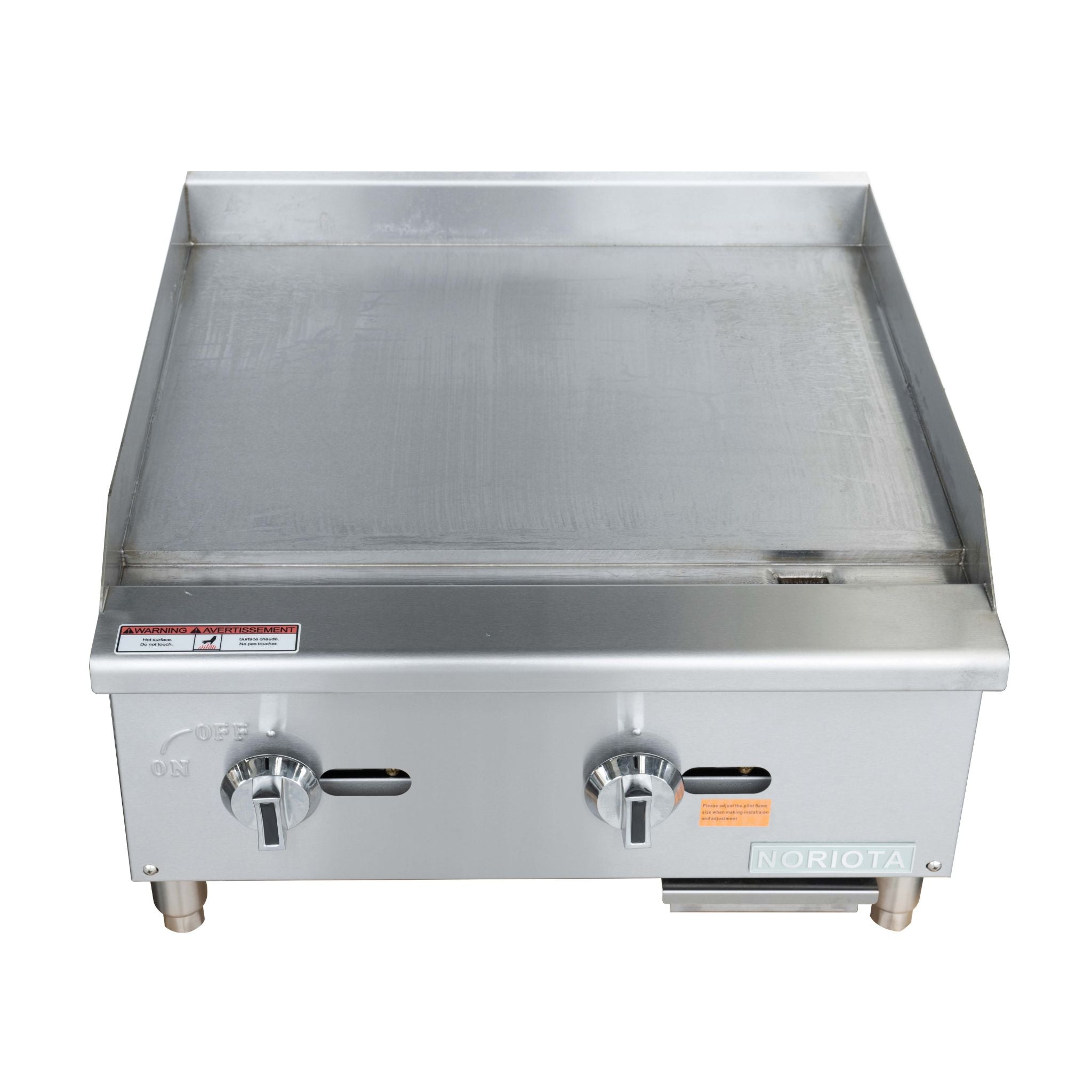 A stainless steel commercial flat top grill or gas manual griddle with two front control knobs, shown against a plain white background.