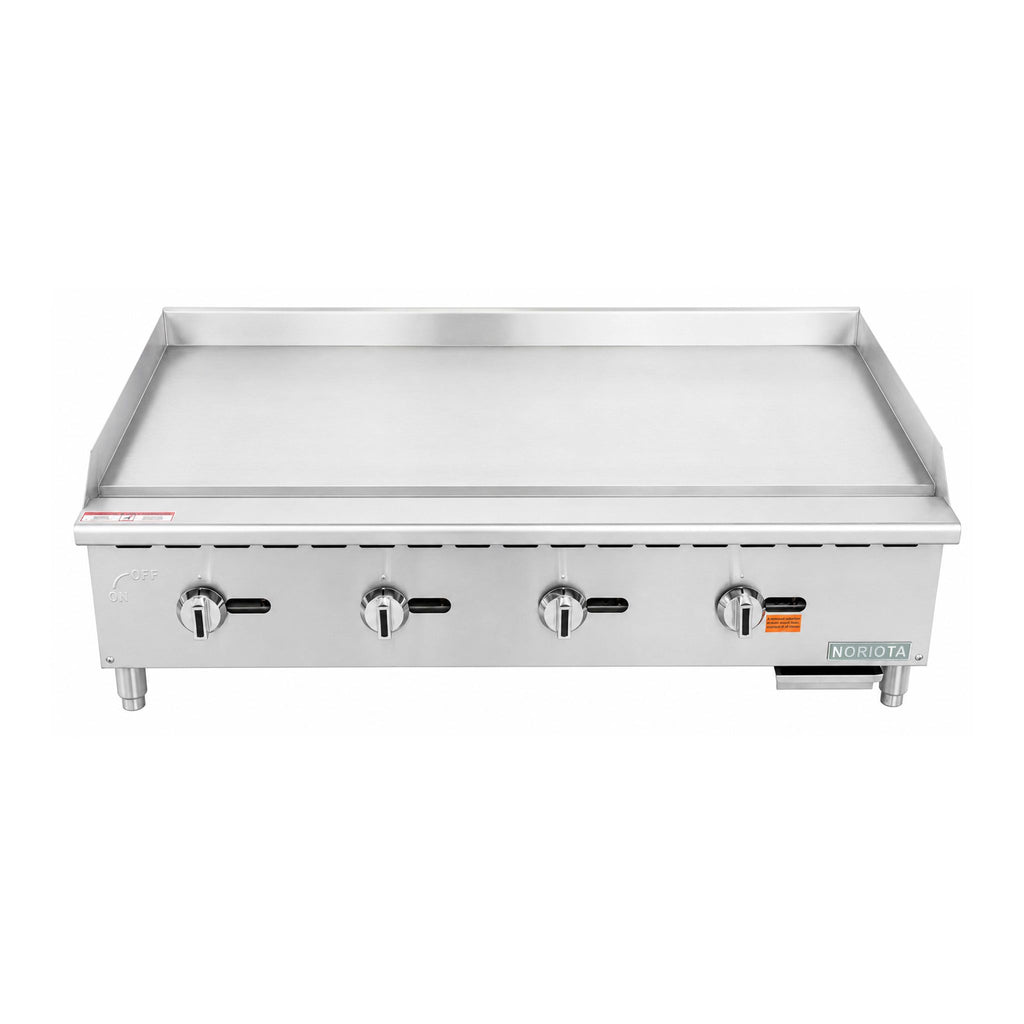 A stainless steel commercial gas manual griddle with four control knobs on the front, set against a plain white background.