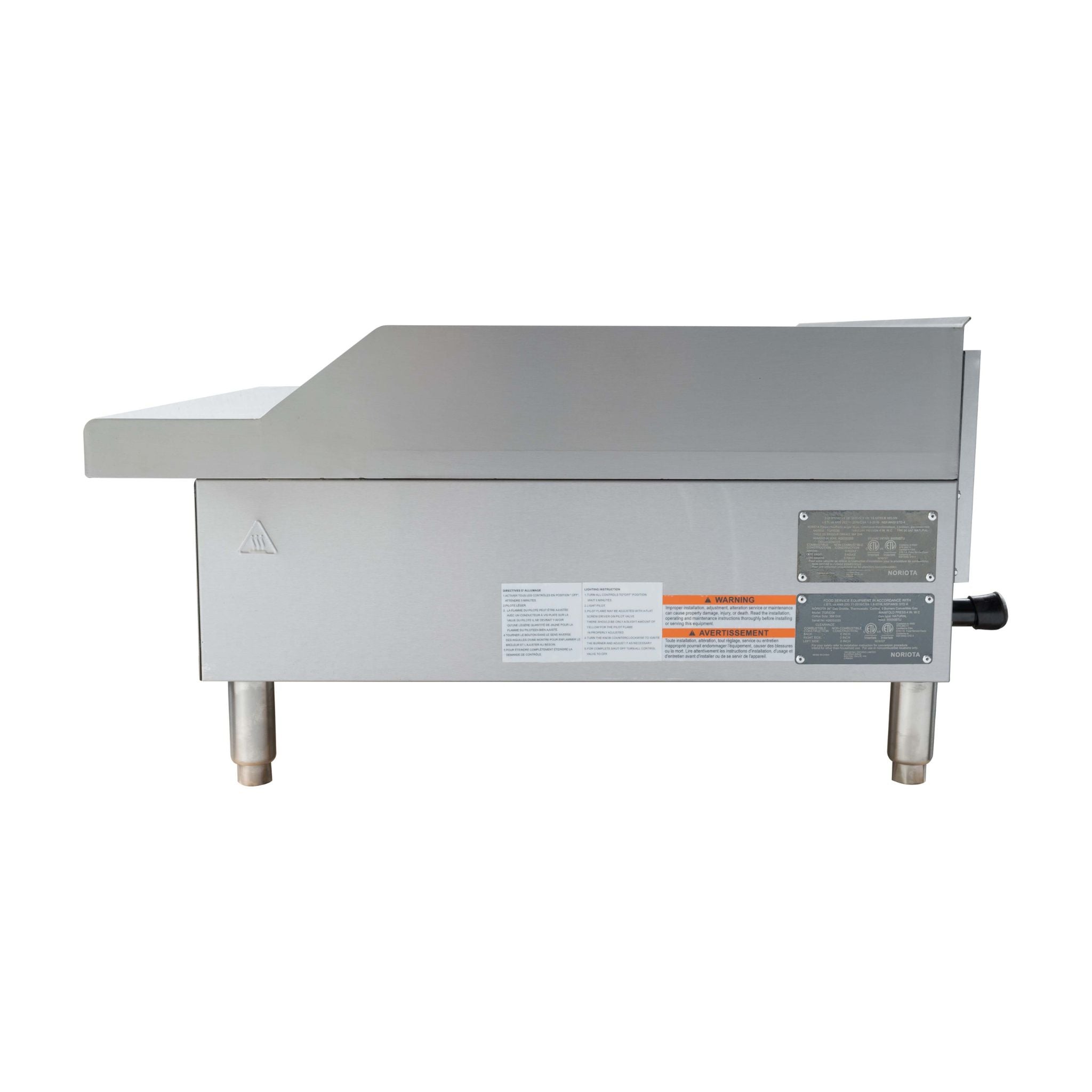A stainless steel commercial countertop flat top grill or thermostatic griddle unit with four legs, featuring warning labels and a power cord on the side, photographed against a plain white background.