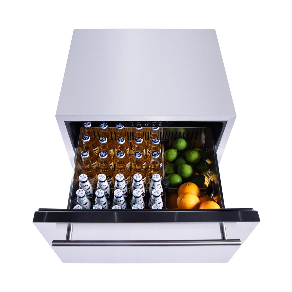 noriota NUR24DOPSS two drawer refrigerator, top drawer open with beer and garnishes, indoor outdoor